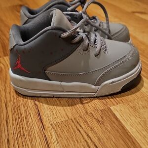 Kids Gray and Pink Nike Jordan's